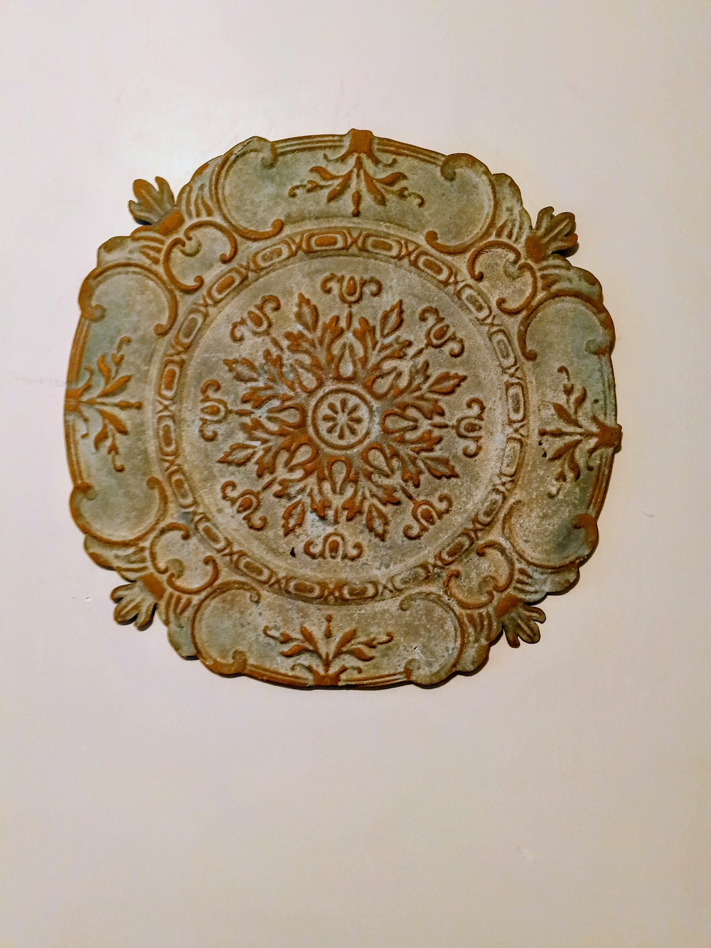 Decorative Ornate Wall Plaque in Aged Green and Rust